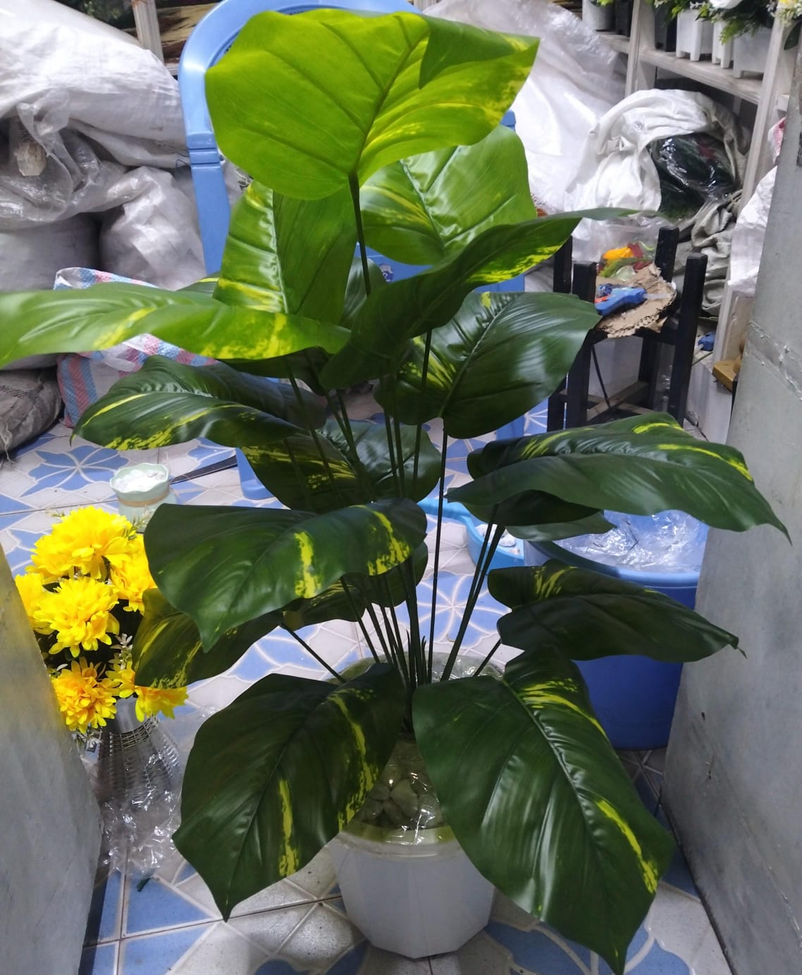 Artificial Flower Arrangement Set    Made from environmentally friendly materials, this decorative piece not only enhances your interior but also contributes to a sustainable lifestyle