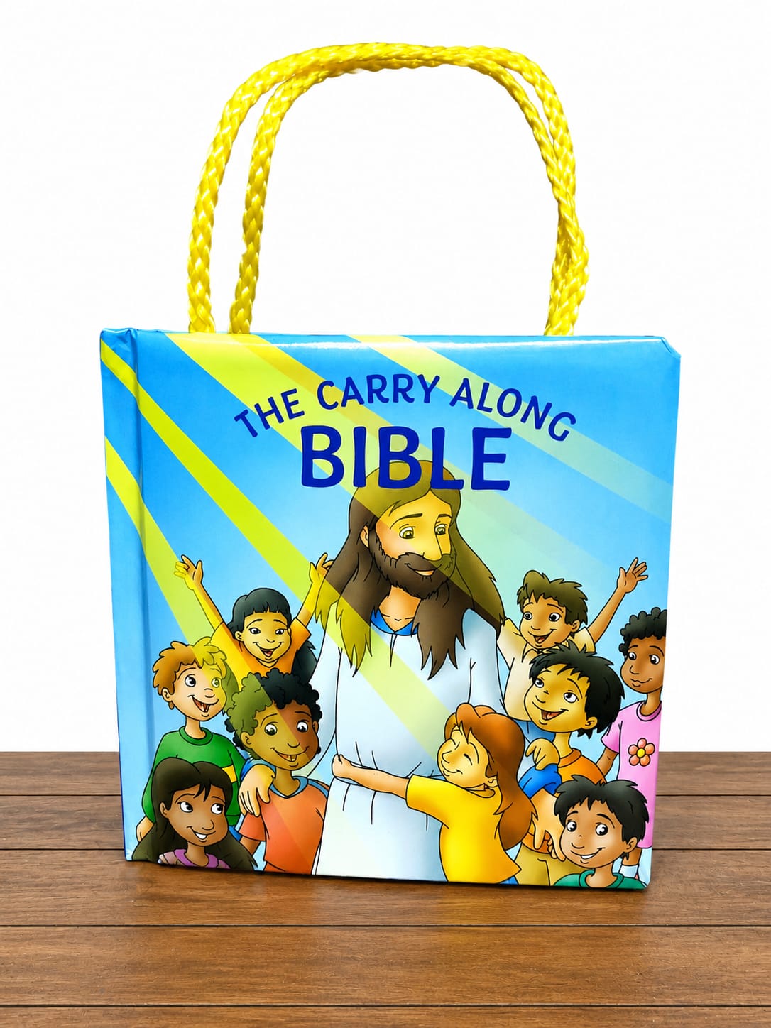 The Carry Along Bible – Kids’ Bible-This colourful kids Bible features delightful illustrations of Jesus and children, bringing beloved Bible stories to life in a way young readers enjoy & understand.