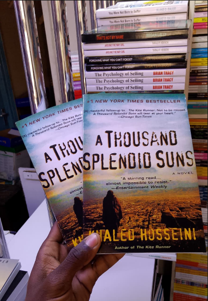A Thousand Splendid Suns by Khaled Hosseini – Emotional Bestselling Fiction Novel The story follows the lives of two women whose paths become connected, exploring themes of family, friendship,