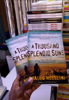 A Thousand Splendid Suns by Khaled Hosseini – Emotional Bestselling Fiction Novel The story follows the lives of two women whose paths become connected, exploring themes of family, friendship,