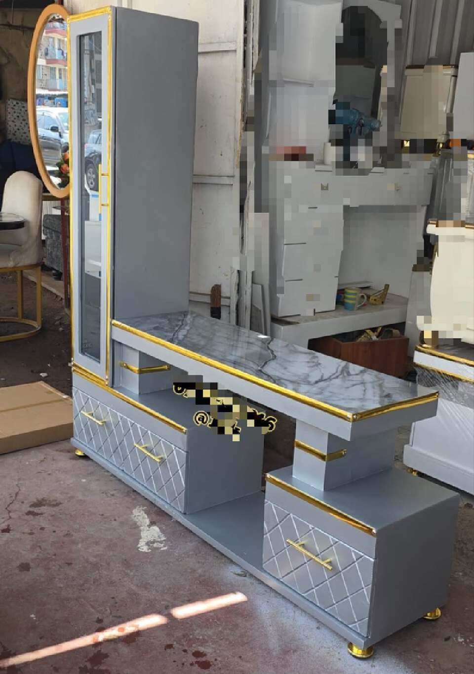 modern grey and gold TV stand with a marble-coated top surface and an attached tall side cabinet with a glass doorModern Grey & Gold TV Stand with Tall Cabinet

Upgrade your entertainment space with t