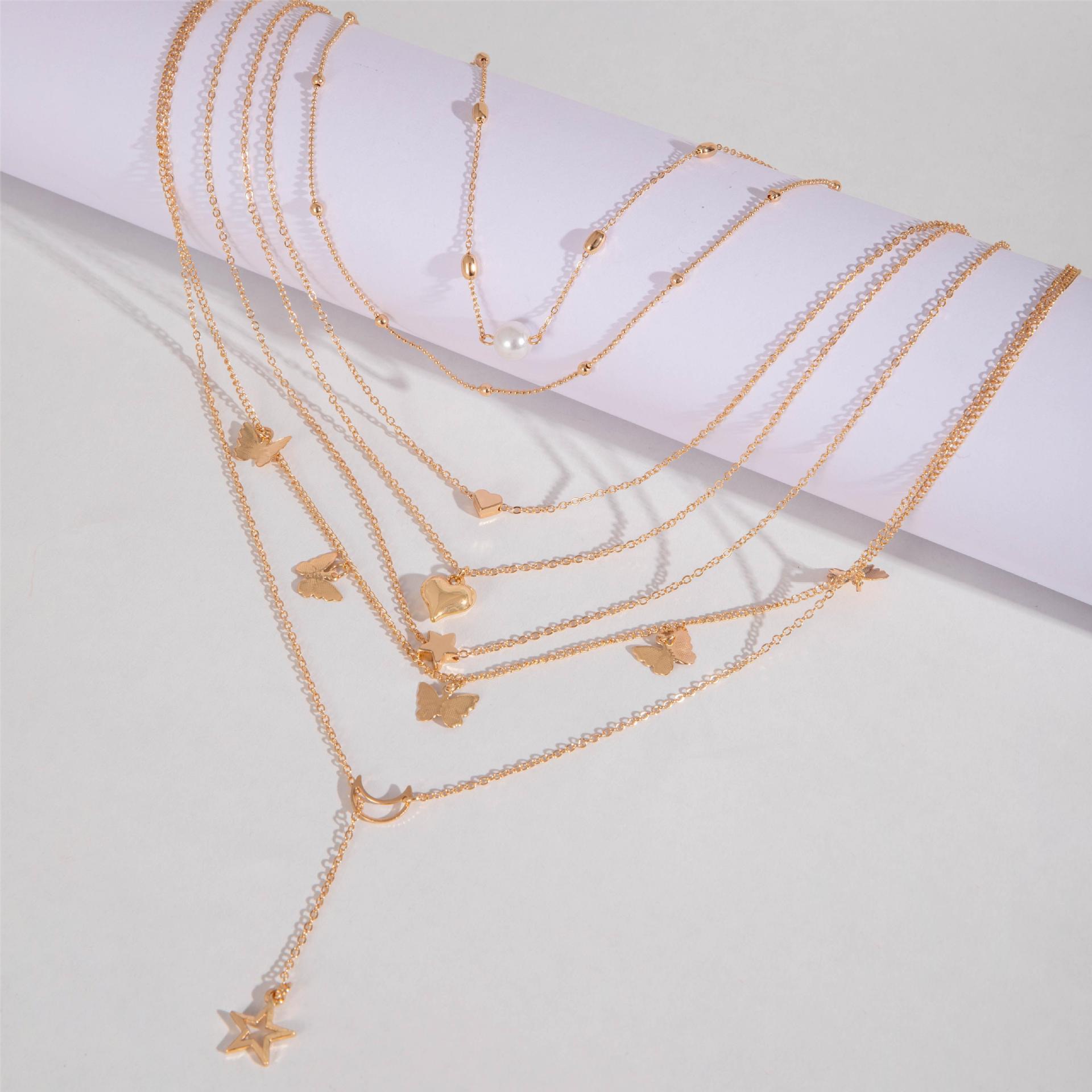 6PCS Ladies' Necklace Luxury Set Butterfly Tassel Layered Moon Pearl Pentagram Set Collarbone Chain Metal Chain Heart Necklace Versatile Personality 6 Mixed And Matched Light Luxury Deluxe Gifts