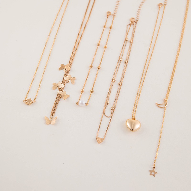 6PCS Ladies' Necklace Luxury Set Butterfly Tassel Layered Moon Pearl Pentagram Set Collarbone Chain Metal Chain Heart Necklace Versatile Personality 6 Mixed And Matched Light Luxury Deluxe Gifts