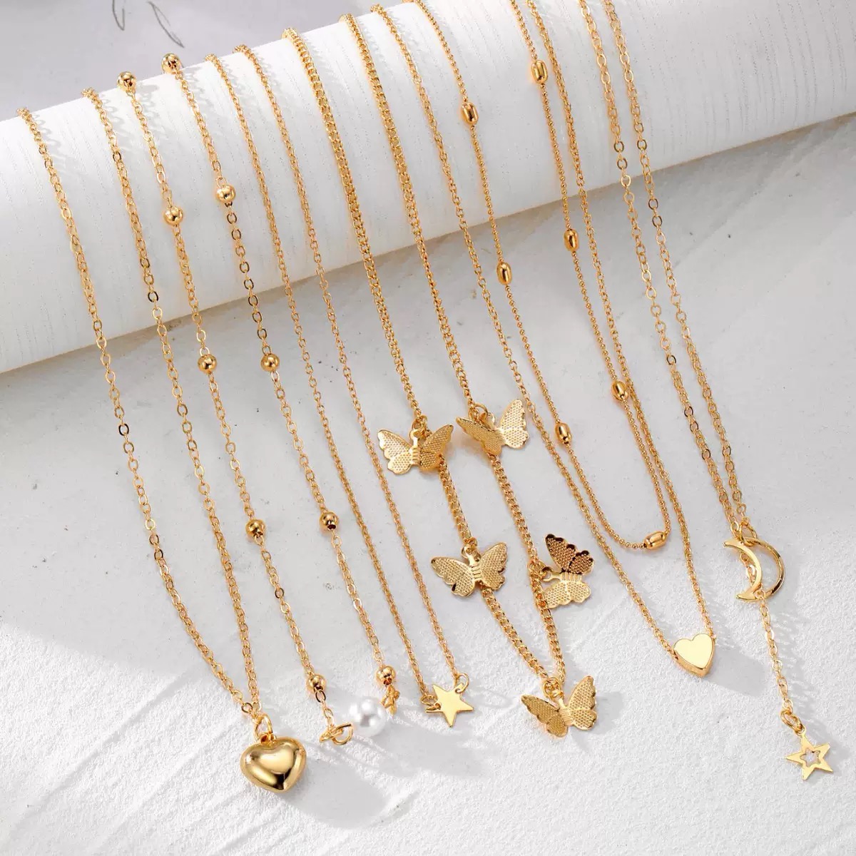 6PCS Ladies' Necklace Luxury Set Butterfly Tassel Layered Moon Pearl Pentagram Set Collarbone Chain Metal Chain Heart Necklace Versatile Personality 6 Mixed And Matched Light Luxury Deluxe Gifts