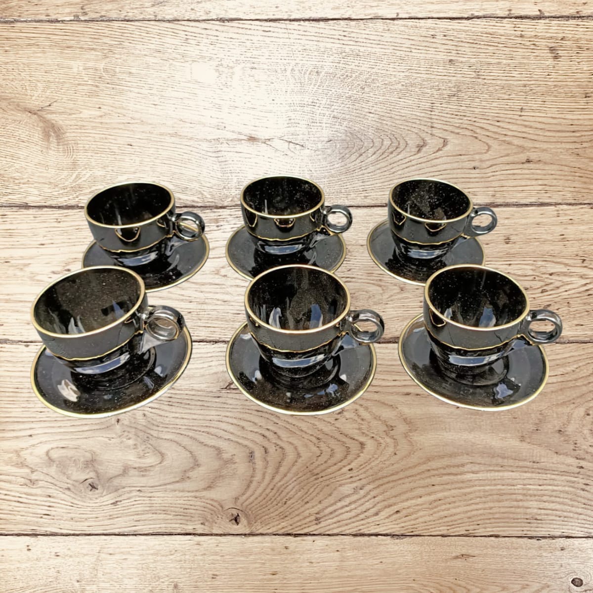 🌟 CUSTOMER FAVORITE OFFER 🌟 - A 6 pc 180cc black cup and saucer with gold rim available at  affordable price and of very high quality