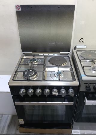 HAIER 60x60, 3 Jet Gas (1 Wok) Burners + 1 Hot Plate, FLAME FAILURE SAFETY, Rotisserie, Black Body with Stainless Steel Top Standing Cooker