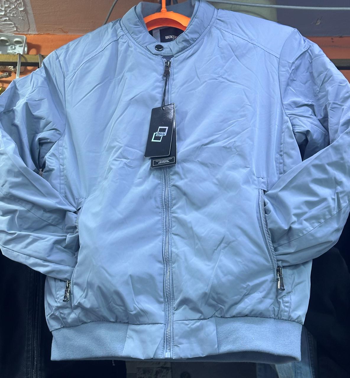 Good Quality smart-casual bomber jacket with a stand-up collar, full-zip front, and ribbed cuffs.