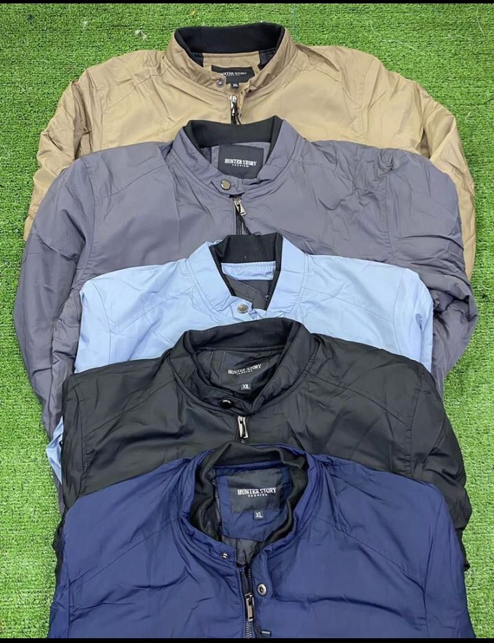Good Quality smart-casual bomber jacket with a stand-up collar, full-zip front, and ribbed cuffs.