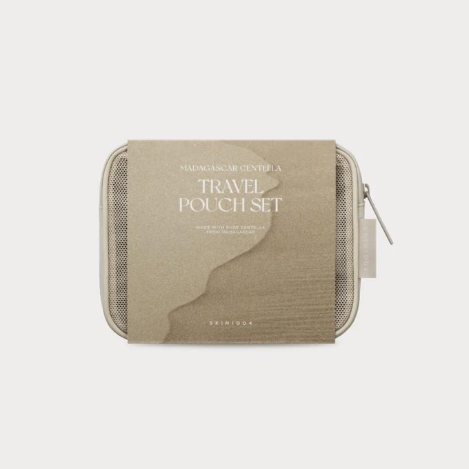SKIN1004 Madagascar Centella 6 in 1 Travel Pouch Set containing Centella Ampoule Foam, Centella Soothing Cream, Centella Ampoule, Centella Light Cleansing Oil, Quick Calming Pad and a Travel Pouch