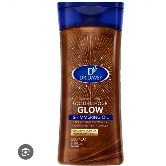 DR.DAVEY Golden Hour Glow Shimmering Body Oil is a lightweight, luminous body oil that enhances the skin with a subtle golden shimmer