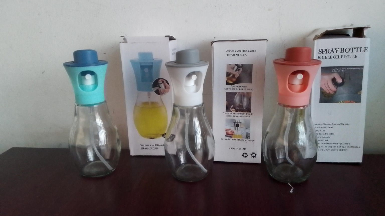 Glass Oil Spray Bottle Make cooking healthier, cleaner and more controlled with this compact oil spray bottle  Perfect budget-friendly kitchen essential for every home Capacity: 200ml