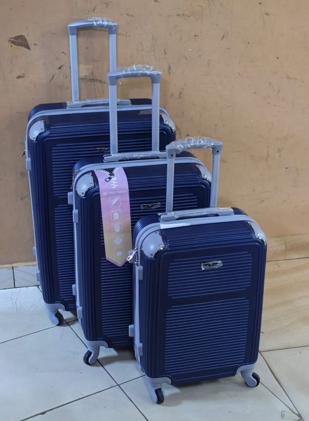 PRICE DROP
3 in 1 Luxurious Fibre Suitcase*

▪️Zipper closure frame.
▪️360 Easy-glide spinner wheels. 
▪️Telescopic handle system locks in multiple levels to adapt.
▪️Compression straps keep clothing
