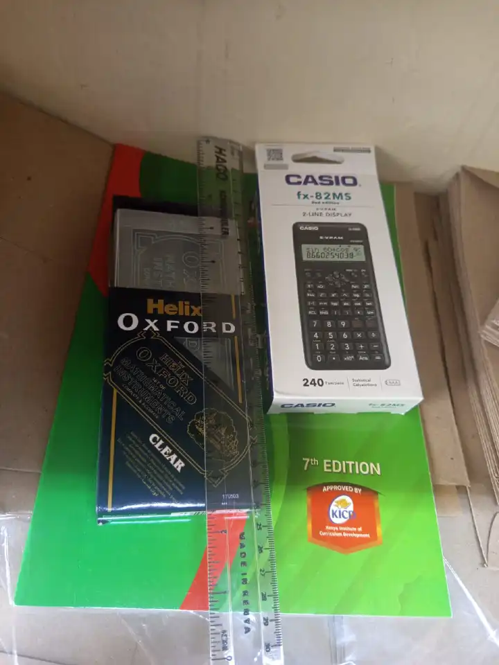 Calculator, Log Table & Mathematical Set – Complete Mathematics Kit -A practical mathematics study set containing a calculator, logarithm table, and mathematical instruments. Ideal for students.