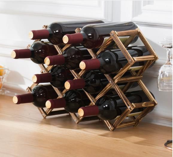 ◾ Perfect for home and restaurant use🎈🎈Foldable10 Slot wooden wine bottle rack🏅🏅Crafted from high-quality durable wood, this wine rack is built to serve you for years. The material is strong, natu