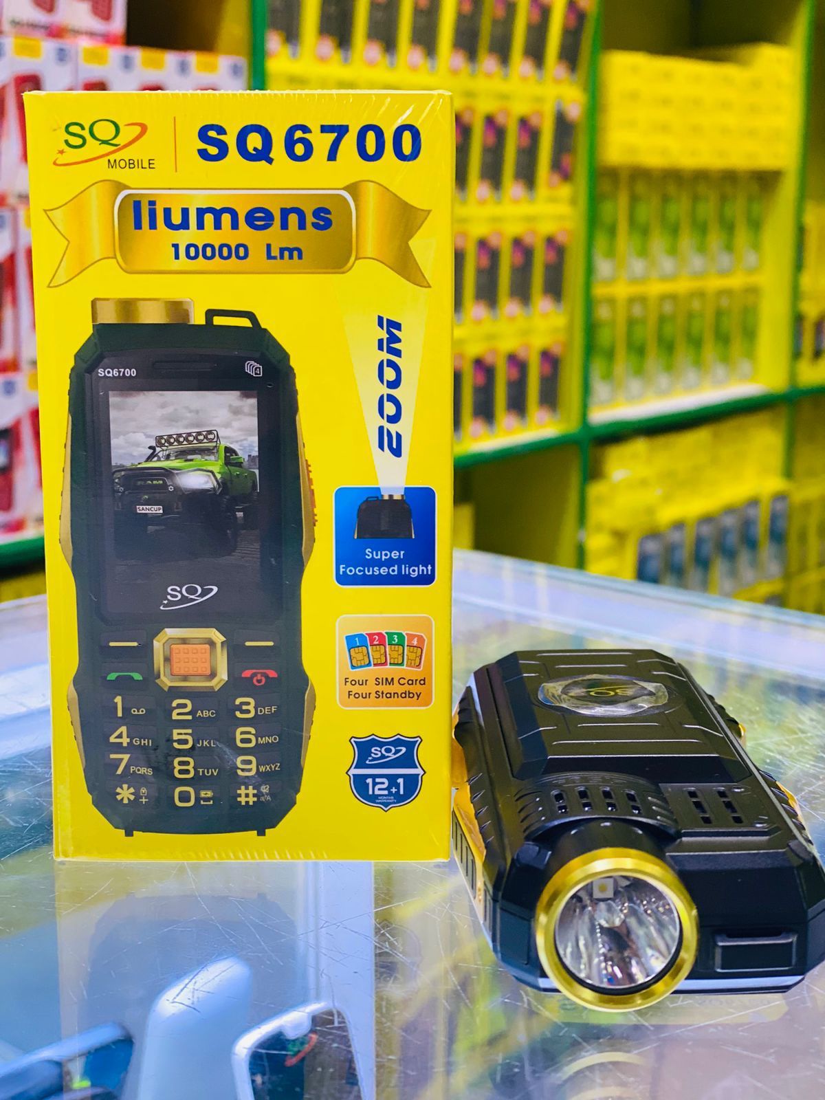 SQ 6700 Feature Phone With Quad SIM (supports 4 SIM cards simultaneously) Big LED Torch Light., Battery 6800mAh, Bluetooth, 3.5mm audio jack, and Wireless FM Radio