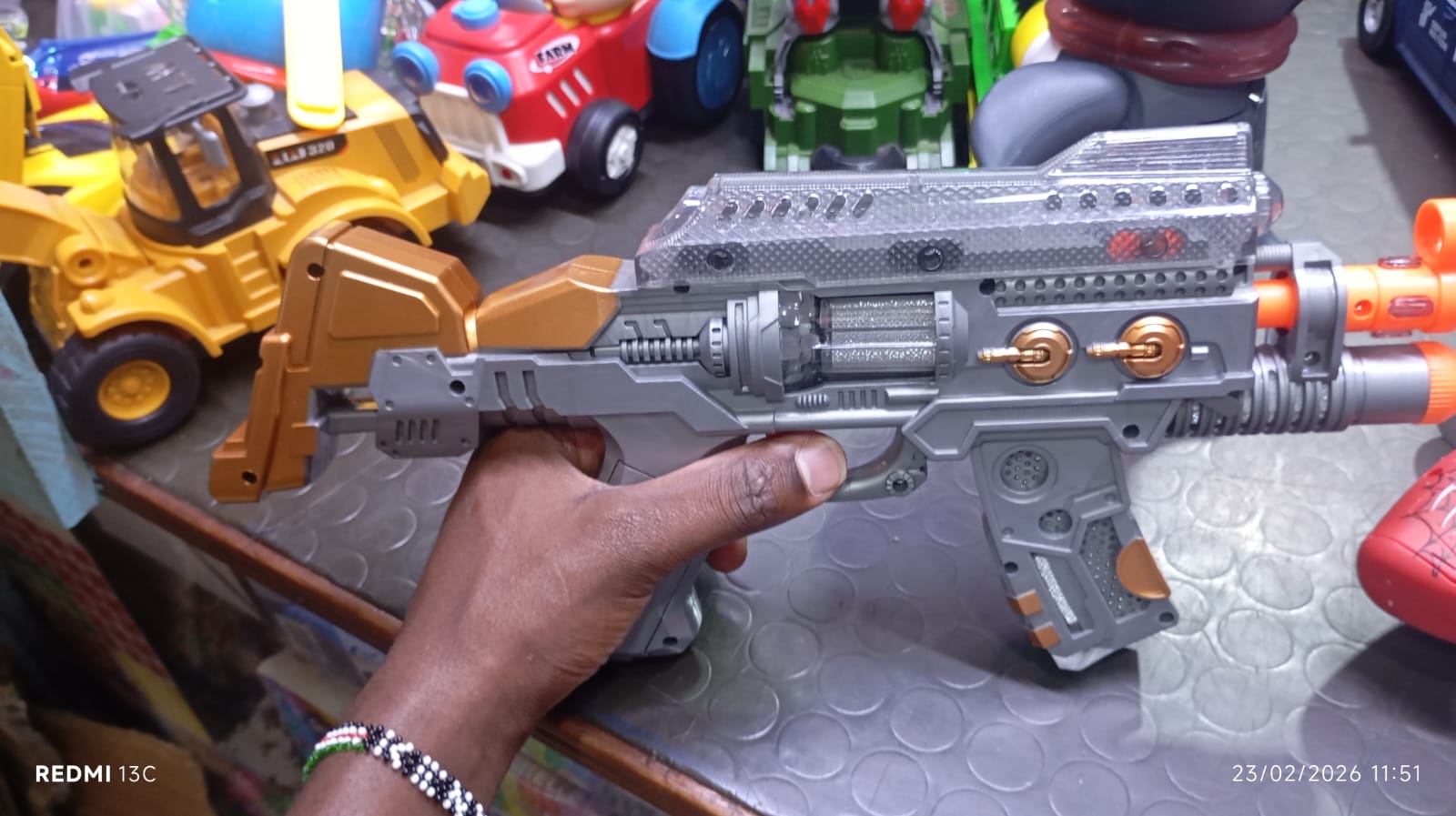 Kids Vibrating Toy Gun With Sound And Light Beam..The toy makes real sound, and pin point the target with beam light. It uses batteries to functional. The best enjoyment while indoor or outdoor.