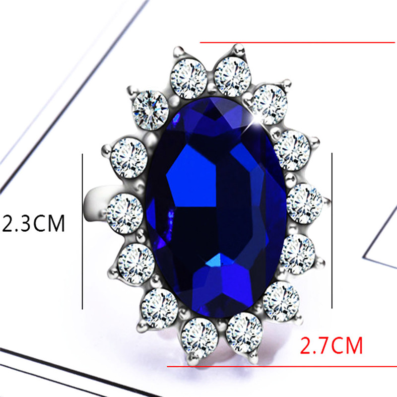 Silver Plated Rhodium Plated Simulated Blue Sapphire and Cubic Zirconia Halo Ring