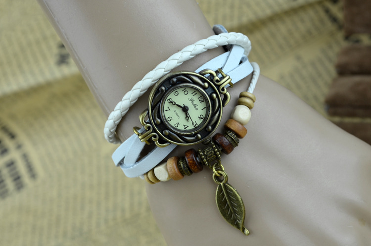 Europe and the United States popular Retro Watch Creative Bracelet style Ms Leaves Pendant Watch