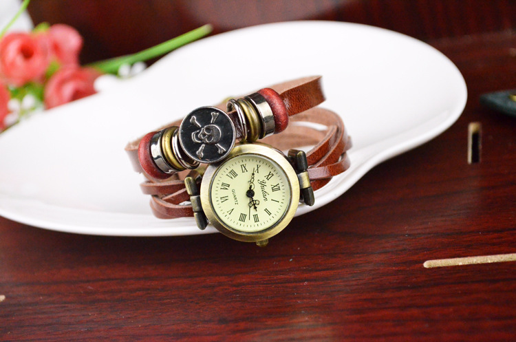Retro Winding Watch fashion personality Female table Skull head Artificial Weave Straps Watch