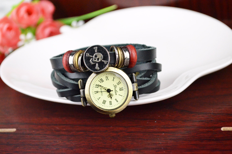 Retro Winding Watch fashion personality Female table Skull head Artificial Weave Straps Watch