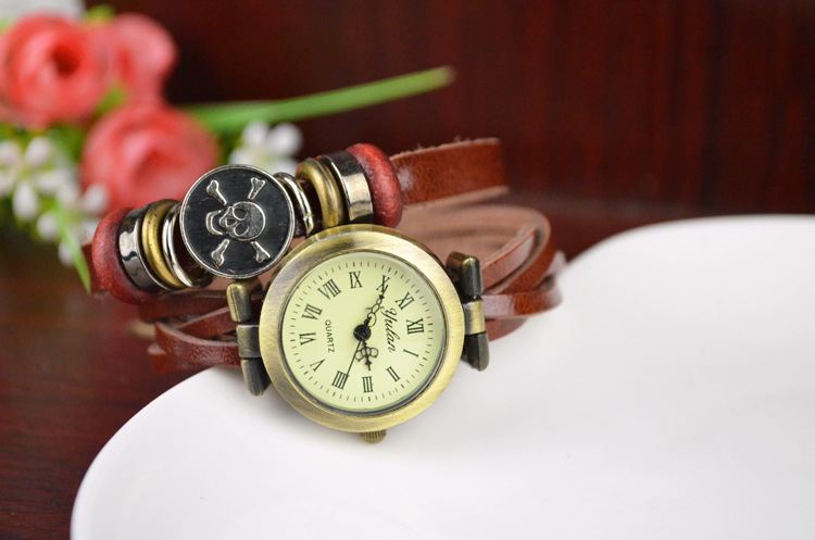 Retro Winding Watch fashion personality Female table Skull head Artificial Weave Straps Watch