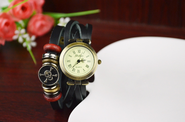 Retro Winding Watch fashion personality Female table Skull head Artificial Weave Straps Watch