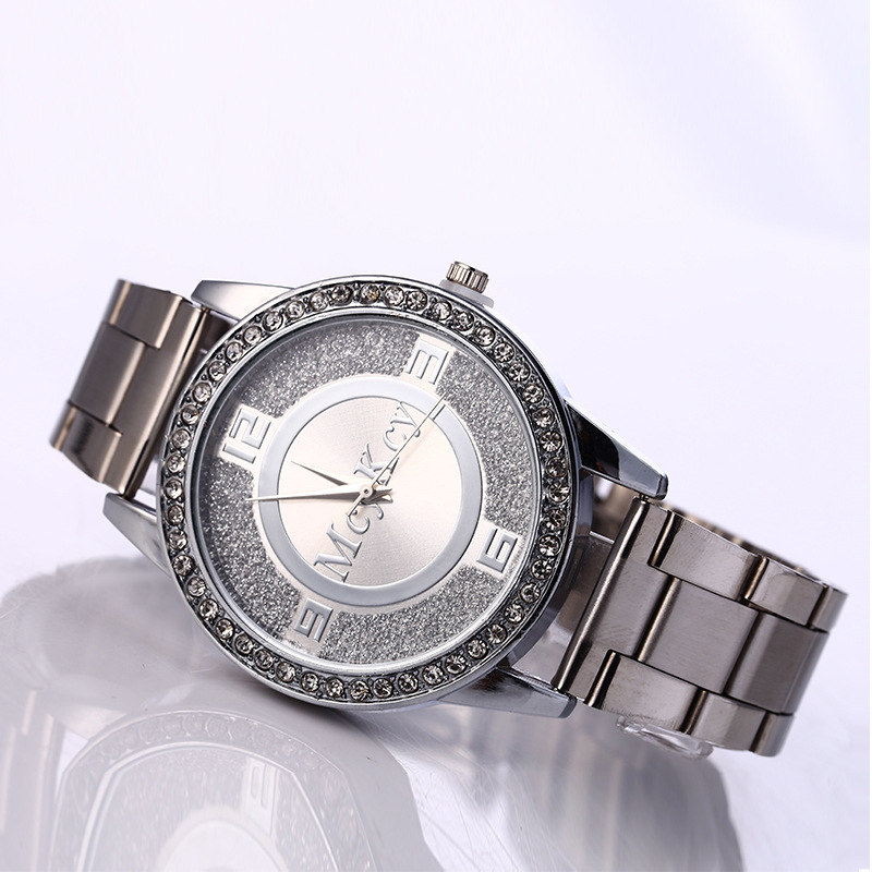 Ms Classic Fashion Steel strip Diamond Watch  The Cross Plate Watch Three Eyes Quartz Watches