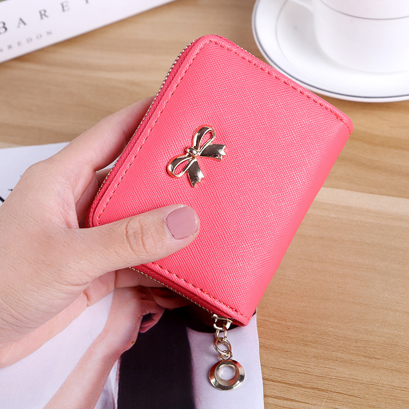 The New lovely Fresh Small wallet Bow tie zipper Coin Purse Female student Wild Hand bag