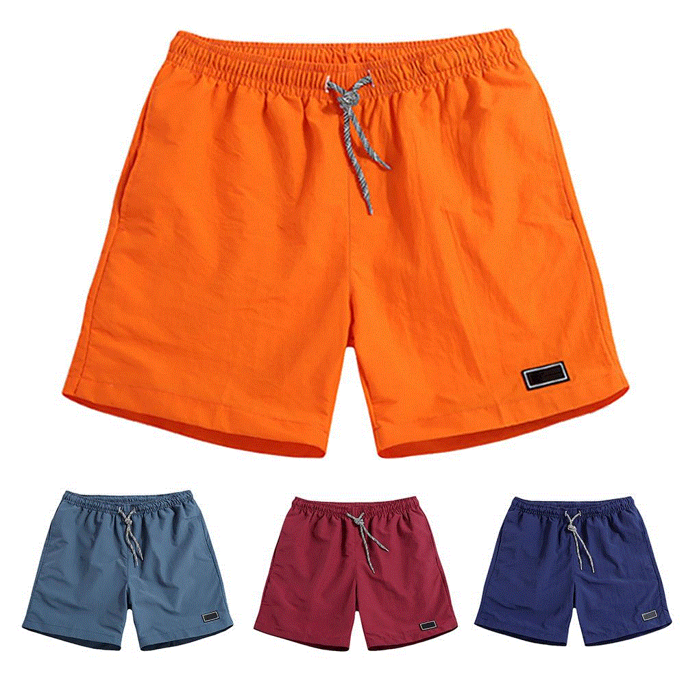 2021 High quality Breathable Quick Dry Pants Pockets Beach Solid Color Running Sport Workout Shorts Training Shorts