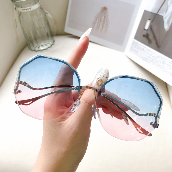2022 new frameless edge-cut sunglasses women's Korean version of the tide net red round face large frame thin anti-ultraviolet sunglasses