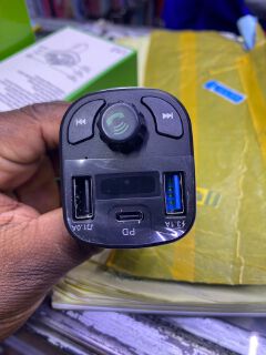 F17 Bluetooth FM Player + Lighter Charger car modulator fm extender with bluetooth connectivity and battery capacity checker.
