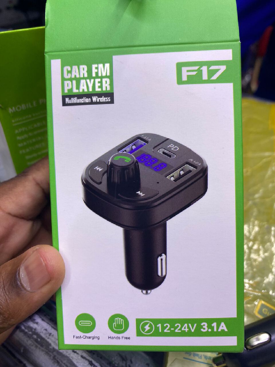 F17 Bluetooth FM Player + Lighter Charger car modulator fm extender with bluetooth connectivity and battery capacity checker.