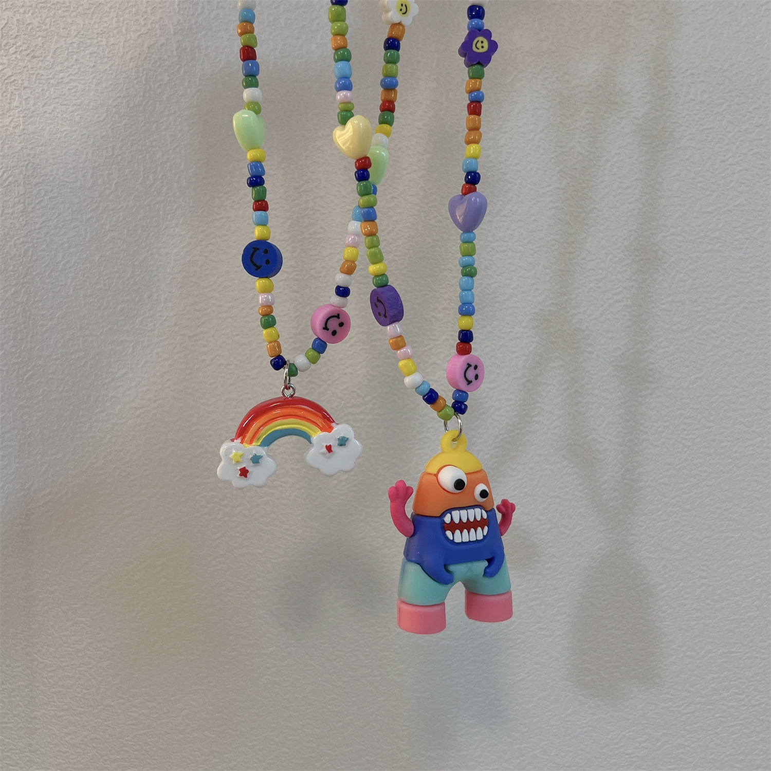 Couple necklace Cartoon monster Pendant Necklace women's new hip-hop color sweater collarbone chain