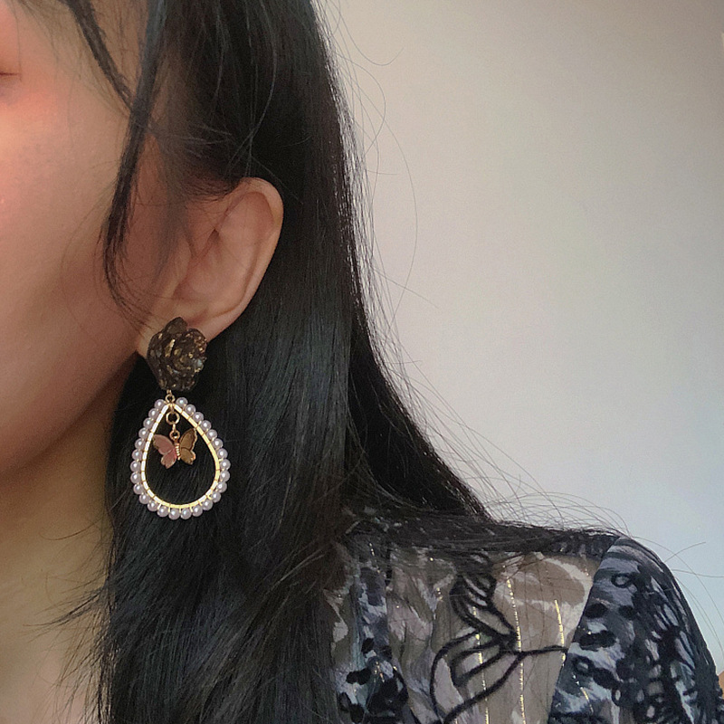 Dark retro temperament gold foil rose tassel butterfly asymmetric Earrings female ear clip